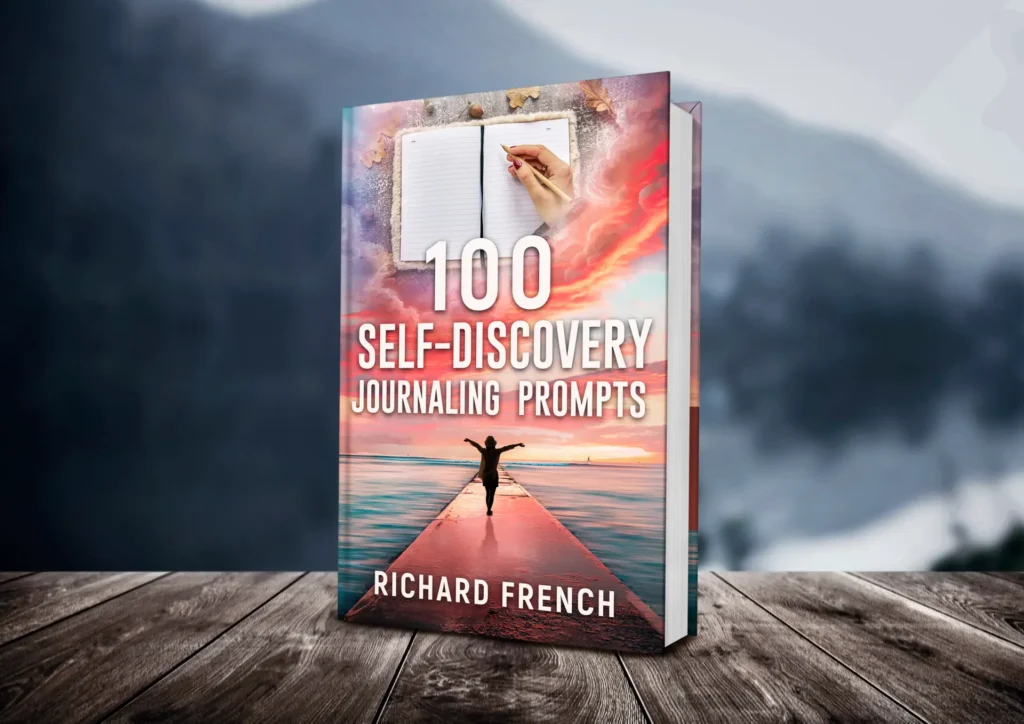 Book cover of '100 Self-Discovery Journaling Prompts' by Richard French featuring an open journal with a hand writing, and a person with outstretched arms standing on a pier at sunset.